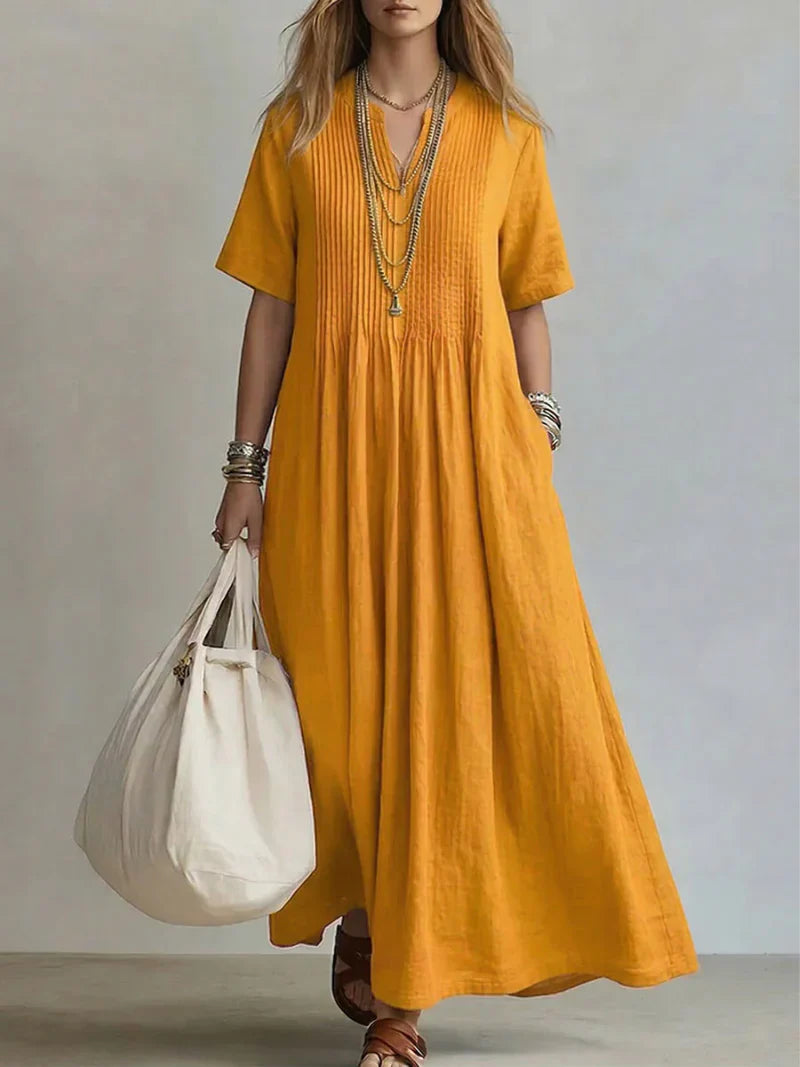 DEVA | Vestido largo plisado