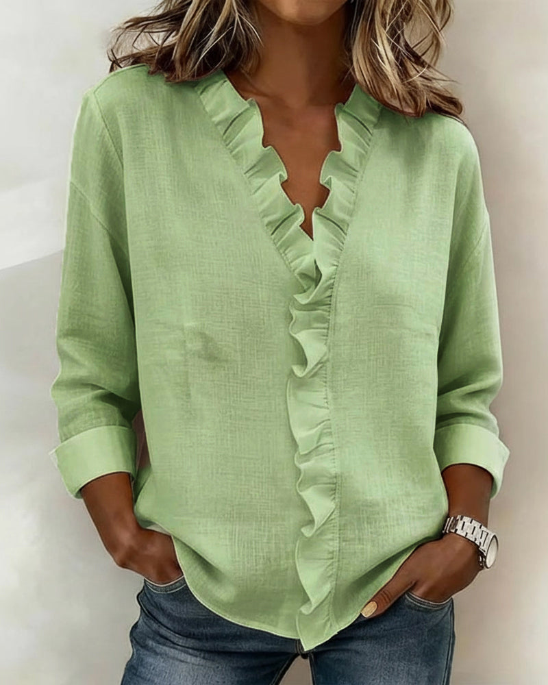 JOANNA | Blusa con escote en V y volante