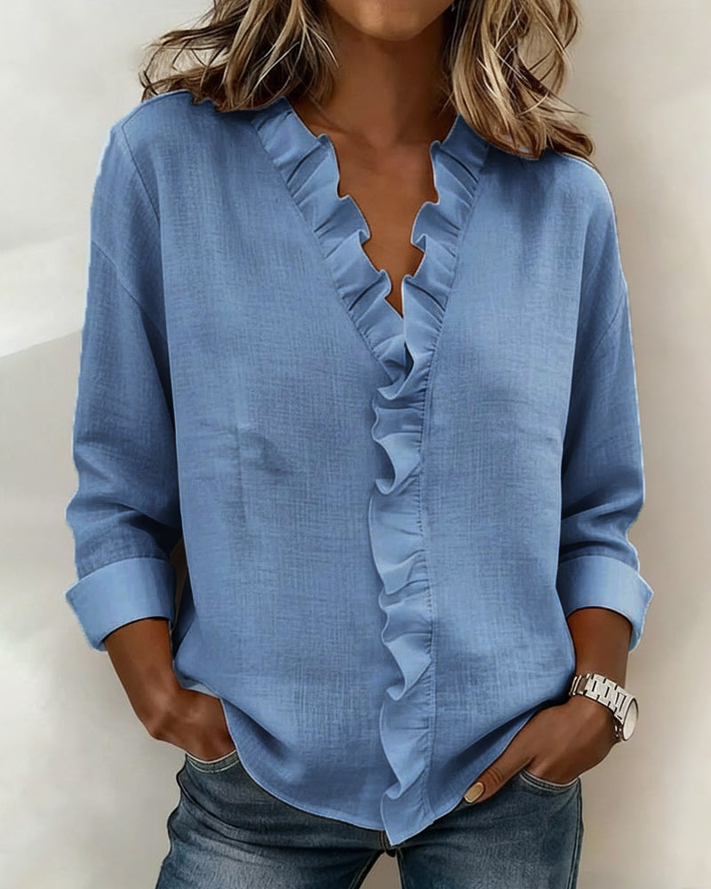 JOANNA | Blusa con escote en V y volante