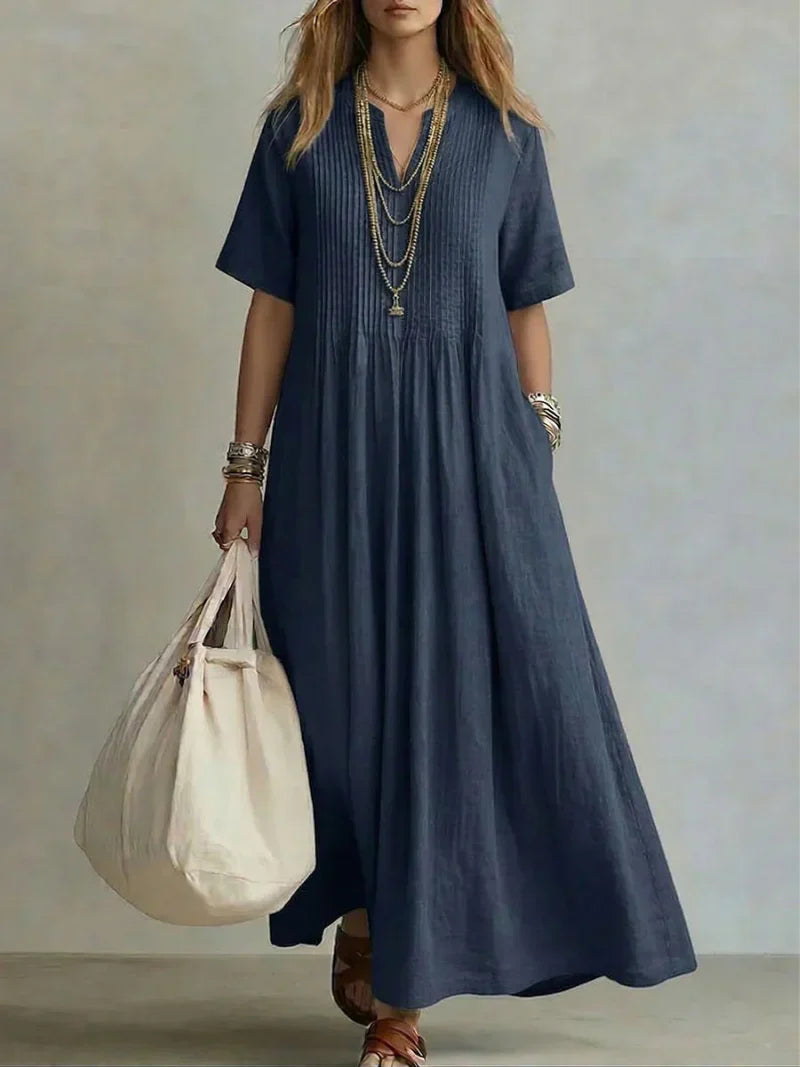 DEVA | Vestido largo plisado