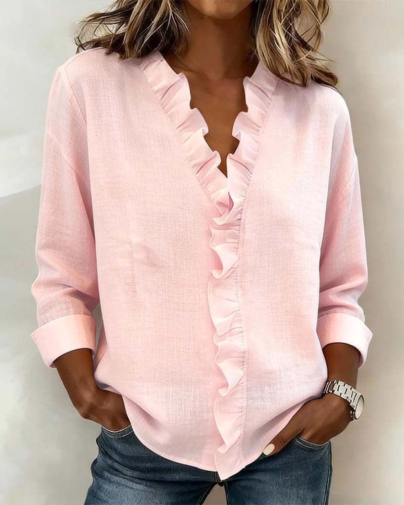 JOANNA | Blusa con escote en V y volante