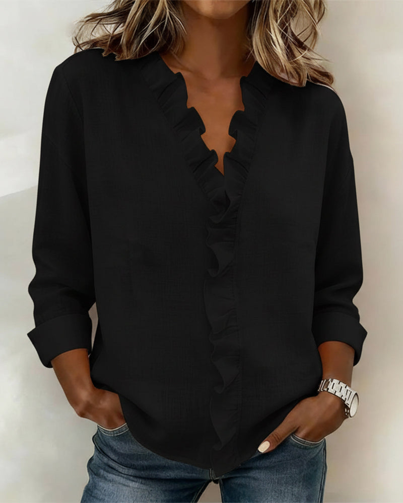 JOANNA | Blusa con escote en V y volante